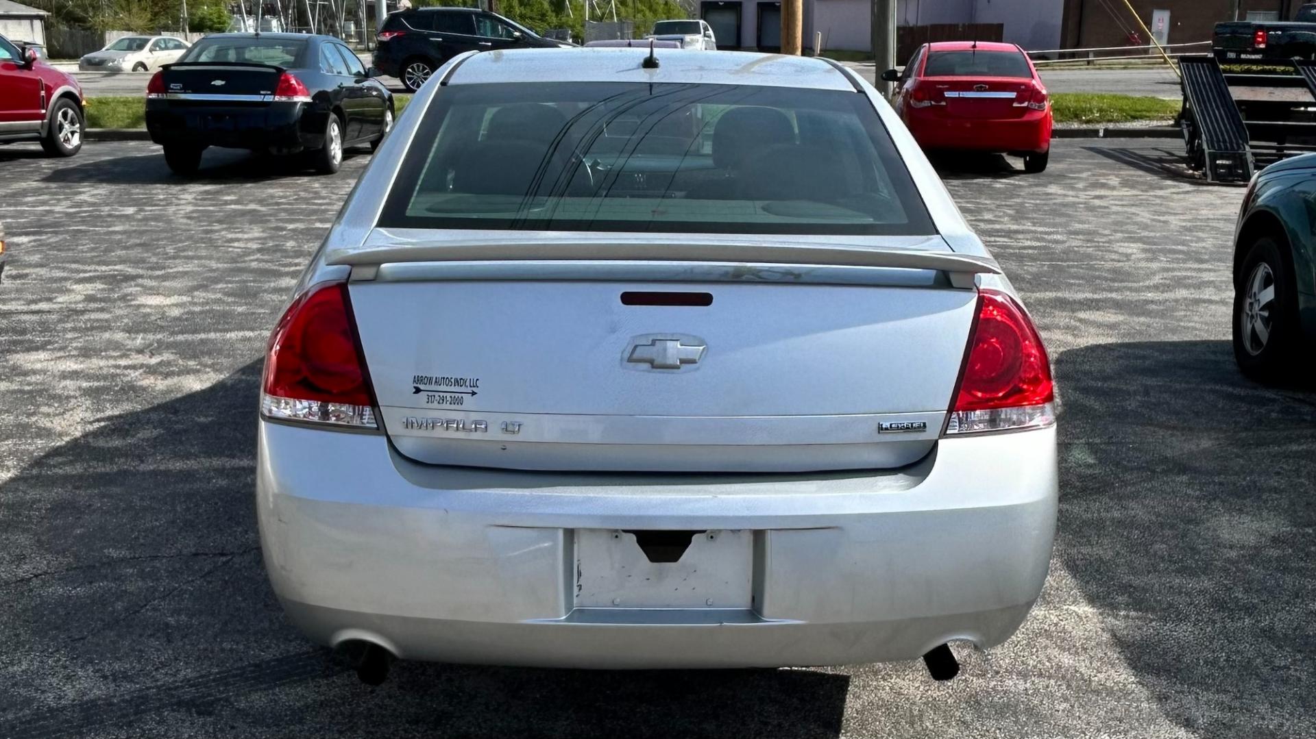 2013 Silver Chevrolet Impala LT (2G1WB5E3XD1) with an 3.6L V6 DOHC 16V FFV engine, 6-Speed Automatic transmission, located at 2710A Westlane Rd., Indianapolis, IN, 46268, (317) 291-2000, 39.885670, -86.208160 - Photo#2